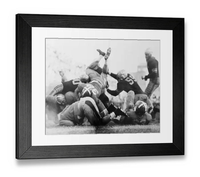 Framed Print : Football Player Scoring a Touchdown Framed Print : Football Player Scoring a Touchdown