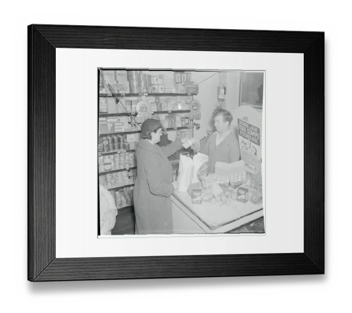 Framed Print : Woman Making a Purchase with Food Stamps Framed Print : Woman Making a Purchase with Food Stamps
