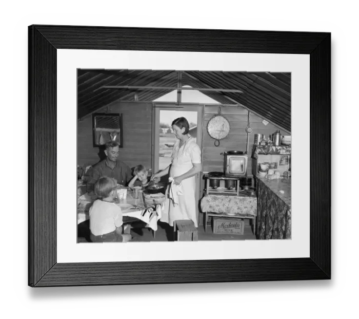 Framed Print : Woman Serves Family Dinner In Clean Home Framed Print : Woman Serves Family Dinner In Clean Home