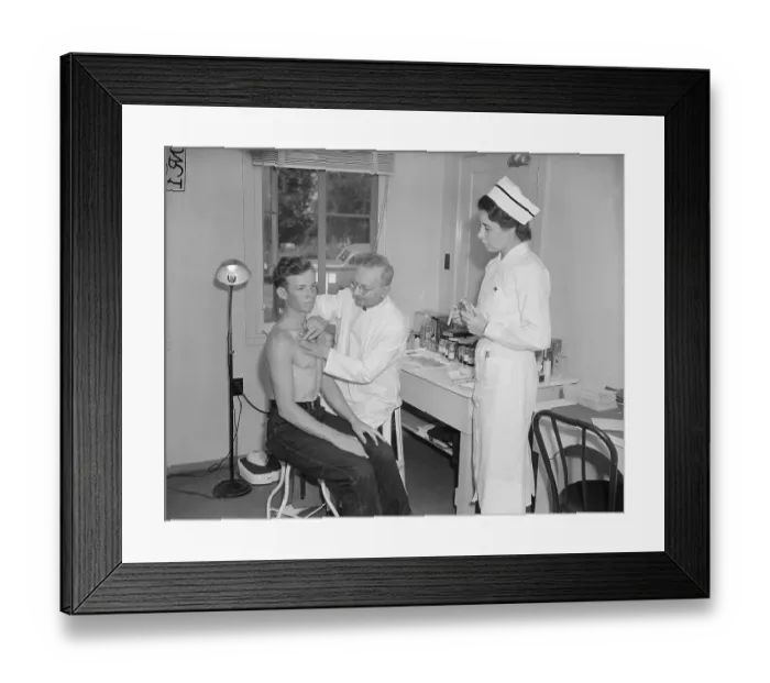 Framed Print : Dr. Ginsburg and Nurse Mann Examine Patient Framed Print : Dr. Ginsburg and Nurse Mann Examine Patient