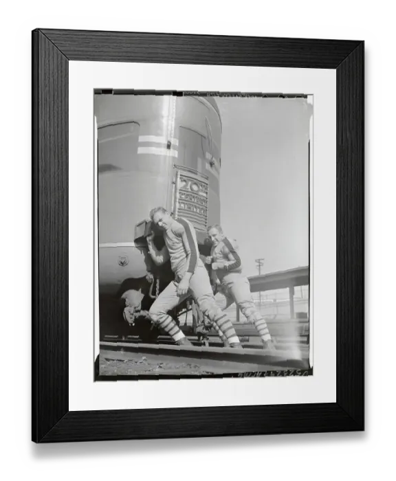 Framed Print : Football Players Pushing Railroad Car Framed Print : Football Players Pushing Railroad Car
