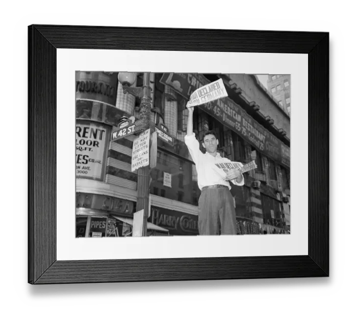 Framed Print : Newsboy Holds Paper with War Declaration Framed Print : Newsboy Holds Paper with War Declaration