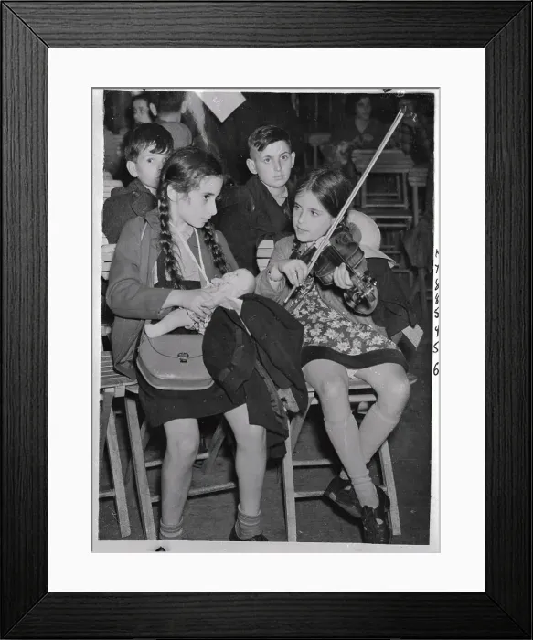 Framed Print : Refugee Musicians Performing on Stools Framed Print : Refugee Musicians Performing on Stools