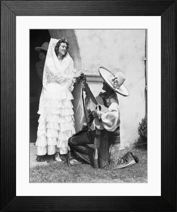 Framed Print : Guitarist Serenading Young Woman Framed Print : Guitarist Serenading Young Woman