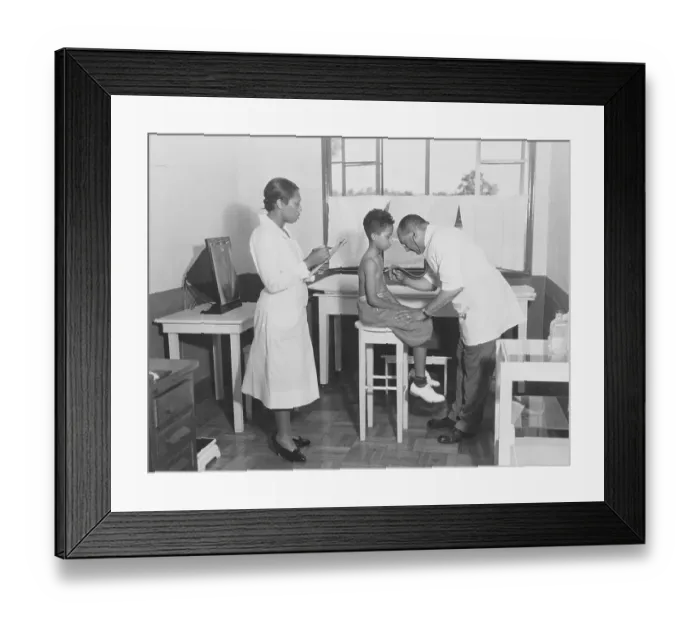 Framed Print : Physician Examining Young Boy at Clinic Framed Print : Physician Examining Young Boy at Clinic