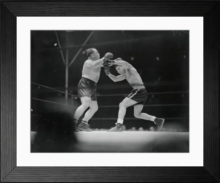 Framed Print : Joe Louis Lunging at Tony Galento Framed Print : Joe Louis Lunging at Tony Galento