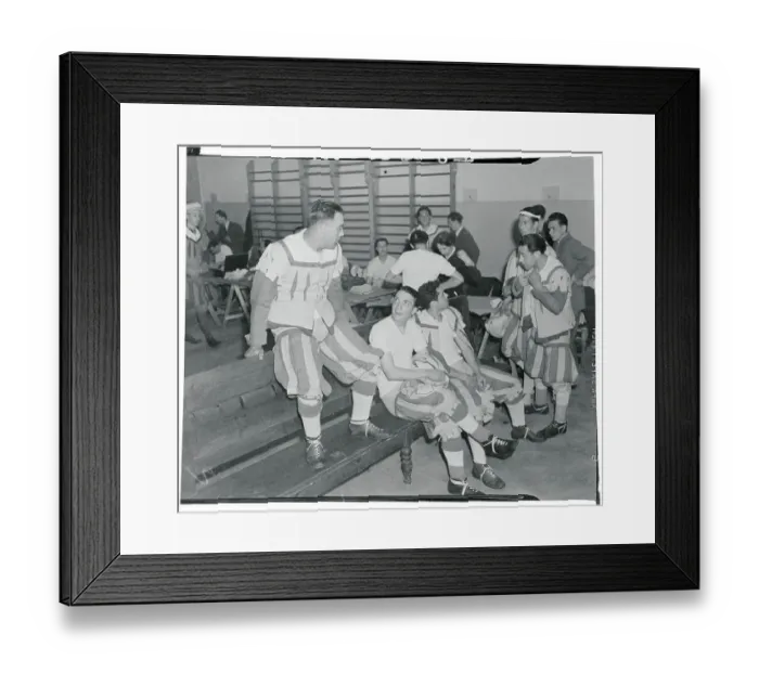 Framed Print : Football Players Sitting Down Framed Print : Football Players Sitting Down
