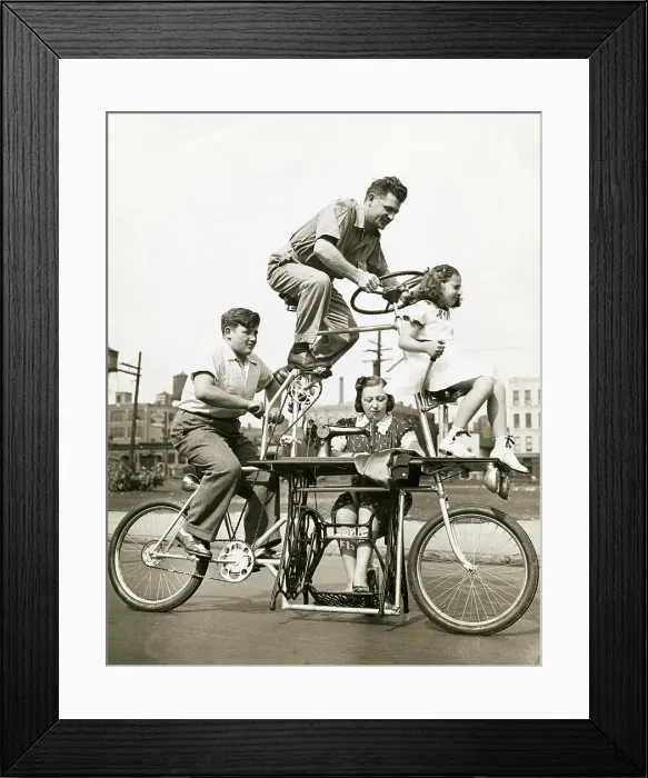 Framed Print : Family on Four Position Bicycle Framed Print : Family on Four Position Bicycle