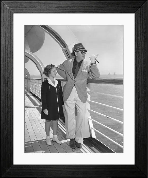 Framed Print : Shirley Temple and John Ford on Ship's Deck Framed Print : Shirley Temple and John Ford on Ship's Deck