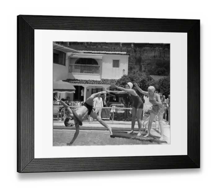 Framed Print : Mickey Rooney Being Pushed into a Pool Framed Print : Mickey Rooney Being Pushed into a Pool