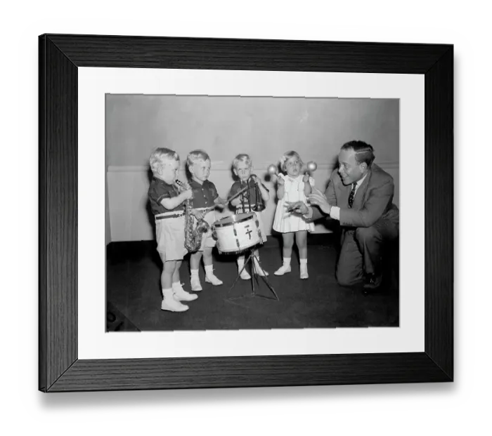 Framed Print : Man Directs Children Playing Instrument Framed Print : Man Directs Children Playing Instrument