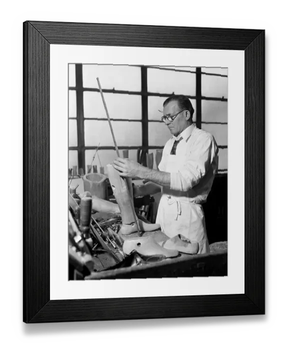 Framed Print : Worker Preparing Artificial Limb Framed Print : Worker Preparing Artificial Limb