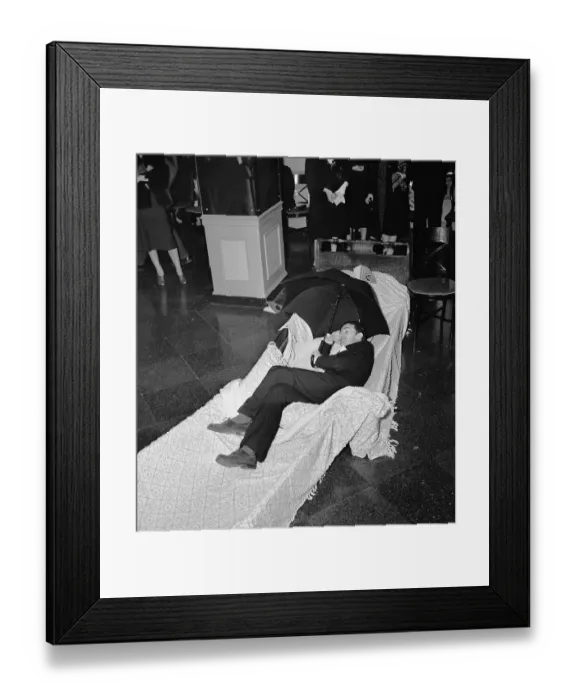 Framed Print : Salvador Dali Lying Down and Holding Umbrella Framed Print : Salvador Dali Lying Down and Holding Umbrella