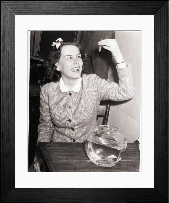 Framed Print : Woman About to Swallow Live Goldfish Framed Print : Woman About to Swallow Live Goldfish