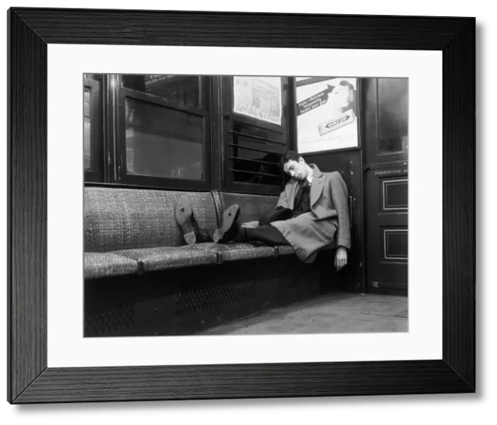 Framed Print : Man Asleep on Subway Framed Print : Man Asleep on Subway