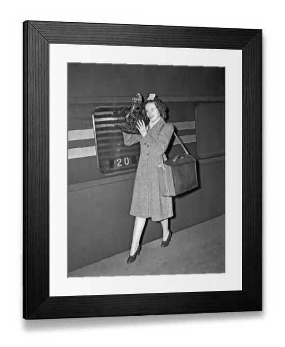 Framed Print : Judy Garland with Camera at Train Station Framed Print : Judy Garland with Camera at Train Station