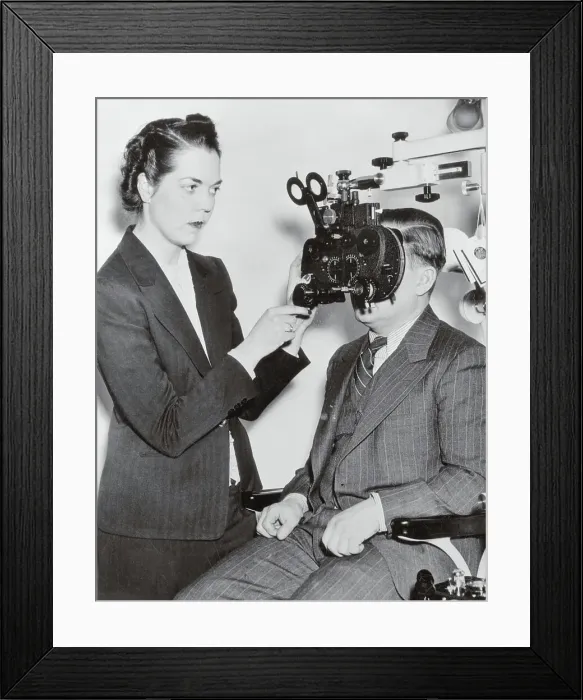 Framed Print : Optometrist Examining a Patient Framed Print : Optometrist Examining a Patient