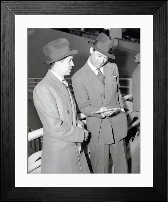 Framed Print : Cary Grant and Alfred Gwynne Vanderbilt Looking at Program Framed Print : Cary Grant and Alfred Gwynne Vanderbilt Looking at Program