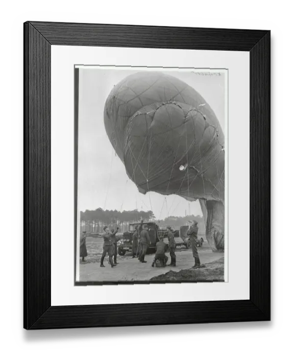 Framed Print : Men Inflating Balloon Framed Print : Men Inflating Balloon