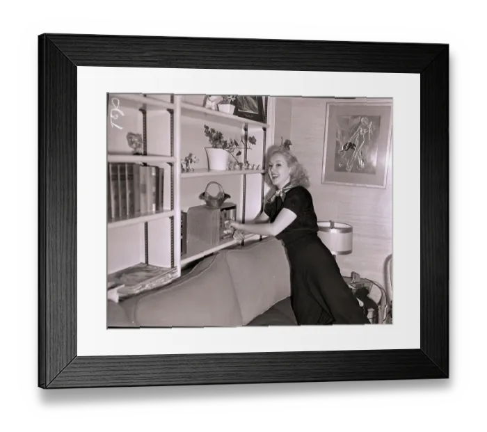 Framed Print : Actress Betty Grable Turning on Radio Framed Print : Actress Betty Grable Turning on Radio