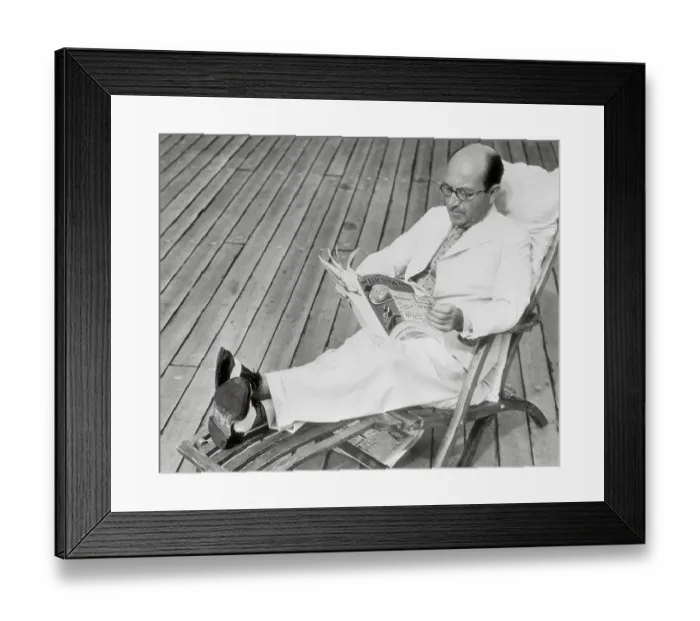 Framed Print : Sir Montague Burton Reading Magazine in Deck Chair Framed Print : Sir Montague Burton Reading Magazine in Deck Chair