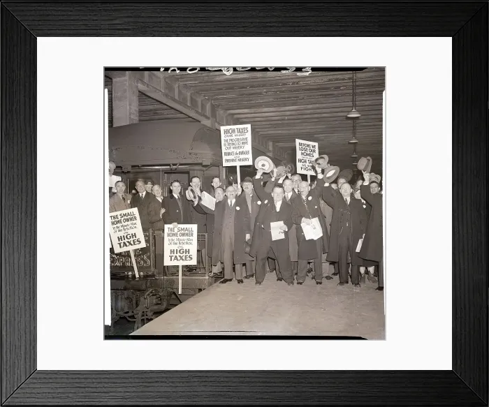Framed Print : Home Owners with Signs Protest High Taxes Framed Print : Home Owners with Signs Protest High Taxes