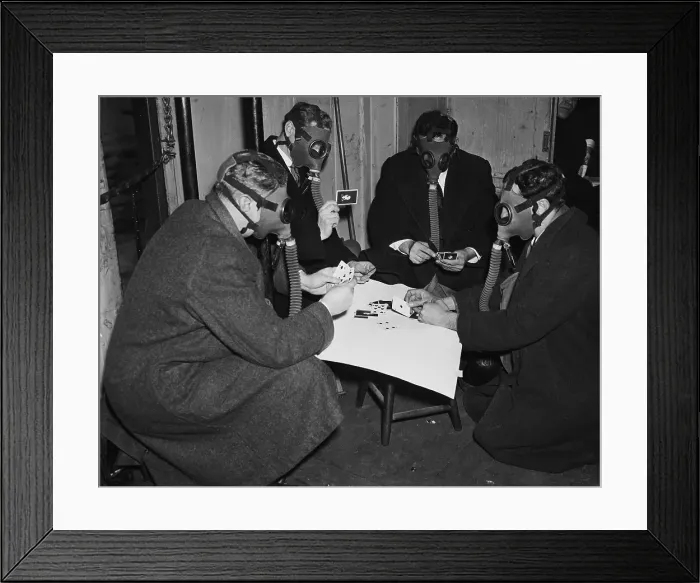 Framed Print : Four Men Play Cards With Gas Masks On Framed Print : Four Men Play Cards With Gas Masks On