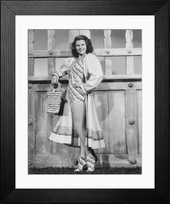 Framed Print : Actress Rita Hayworth Posing by Panel