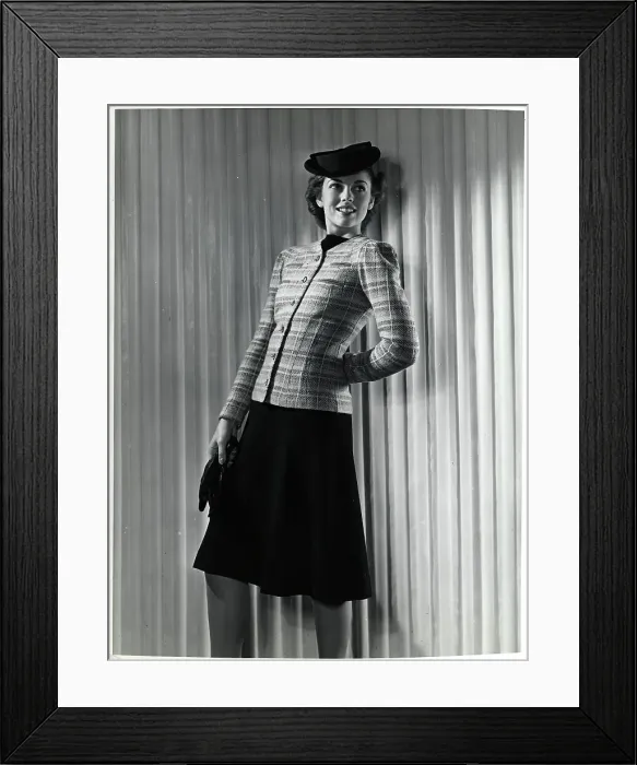 Framed Print : Model Wearing Black Dress with Plaid Coat Framed Print : Model Wearing Black Dress with Plaid Coat