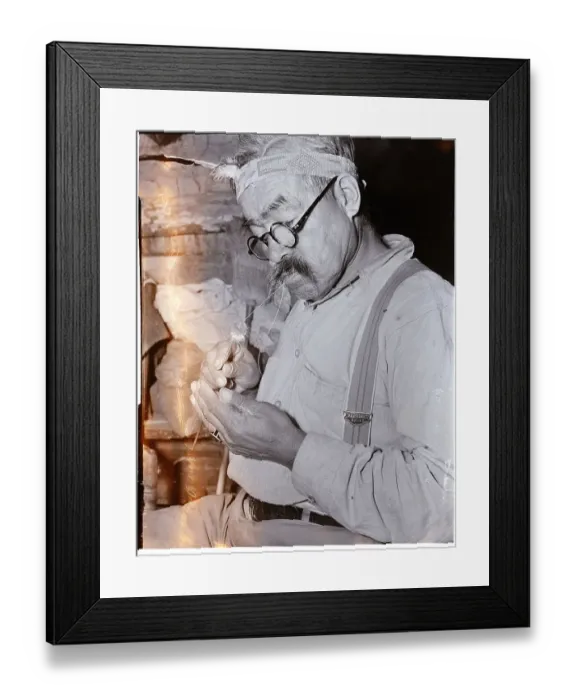 Framed Print : Native American Threading Blowgun Dart