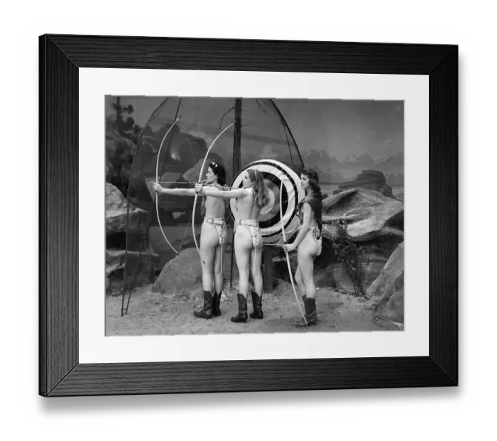 Framed Print : Female Archers at Nudist Colony