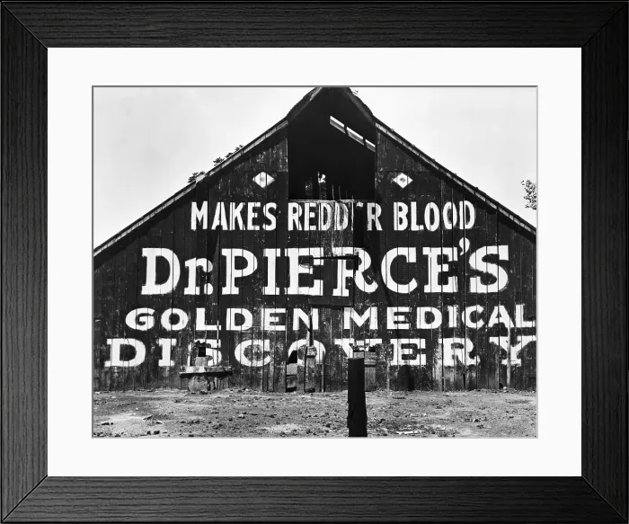 Framed Print : Patent Medicine Sign On A Barn