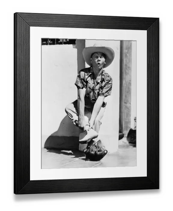 Framed Print : Mickey Rooney Holding His Ankle Framed Print : Mickey Rooney Holding His Ankle