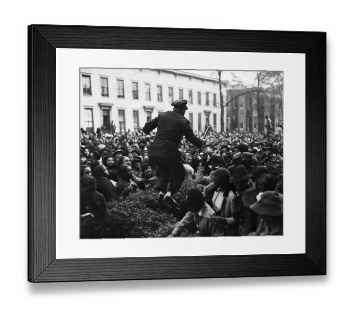 Framed Print : Policeman Jumping Across Crowd Framed Print : Policeman Jumping Across Crowd