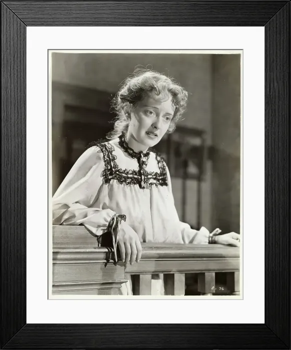 Framed Print : Actress Bette Davis With a Pondering Look on Staircase Balcony Framed Print : Actress Bette Davis With a Pondering Look on Staircase Balcony