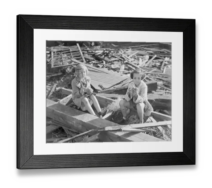 Framed Print : Girls Pick At Debris From Home Framed Print : Girls Pick At Debris From Home