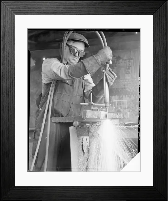 Framed Print : Welder Cuts Through Steel with Torch