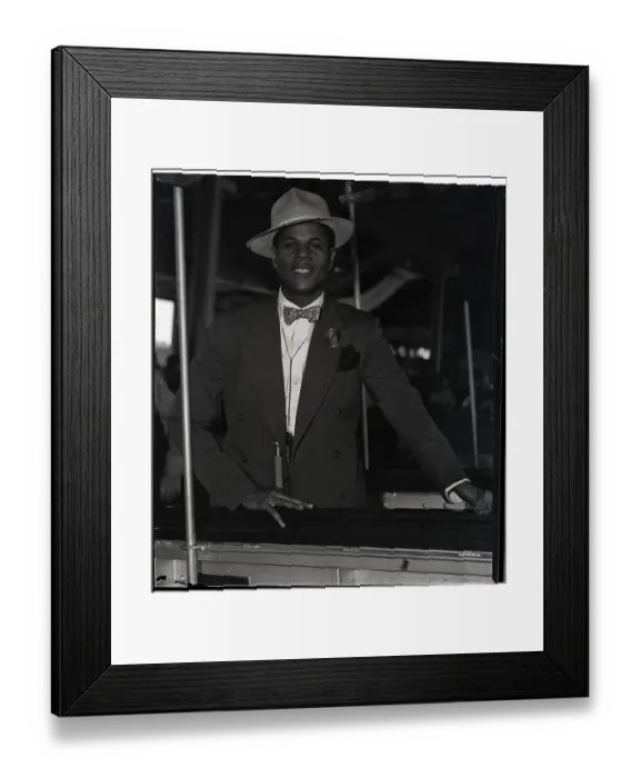 Framed Print : Black Pilot Aboard Boat