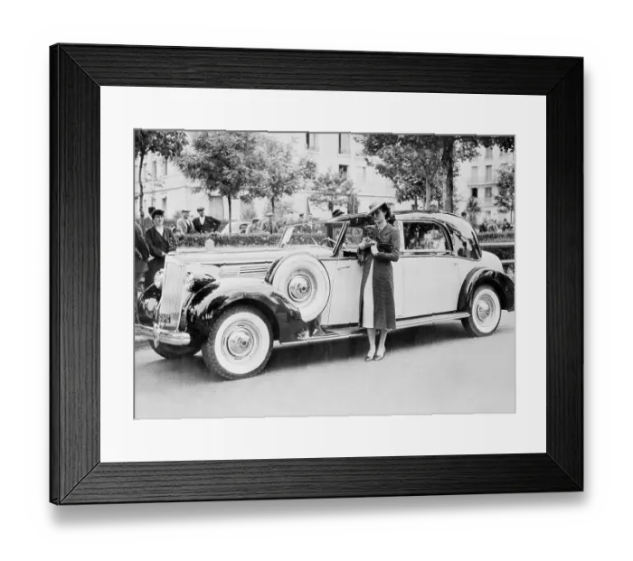 Framed Print : Young Female Model Standing by Car Framed Print : Young Female Model Standing by Car