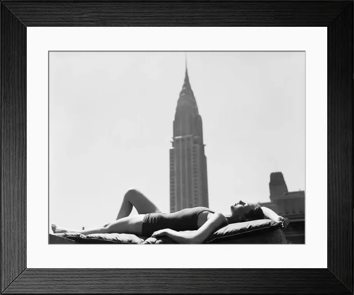 Framed Print : Woman Sun Bathing in Manhattan Framed Print : Woman Sun Bathing in Manhattan