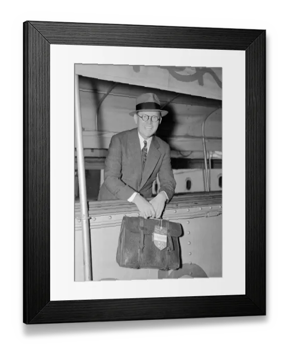 Framed Print : Joseph P. Kennedy Standing on Gangway With His Briefcase