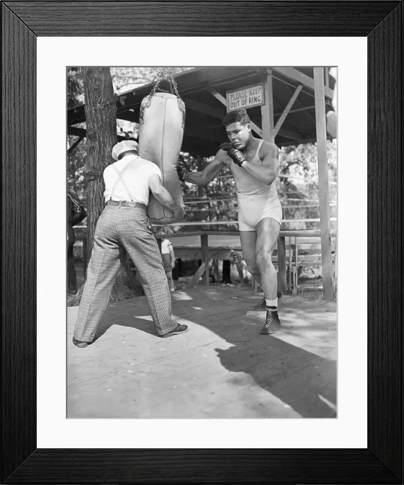 Framed Print : Henry Armstrong Holding Bag for Joe Louis