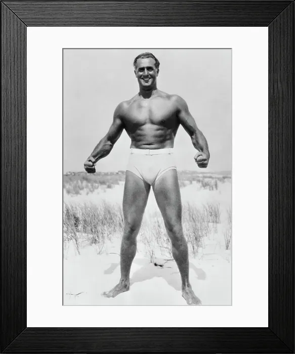 Framed Print : Charles Atlas Flexing Muscles on Beach Framed Print : Charles Atlas Flexing Muscles on Beach