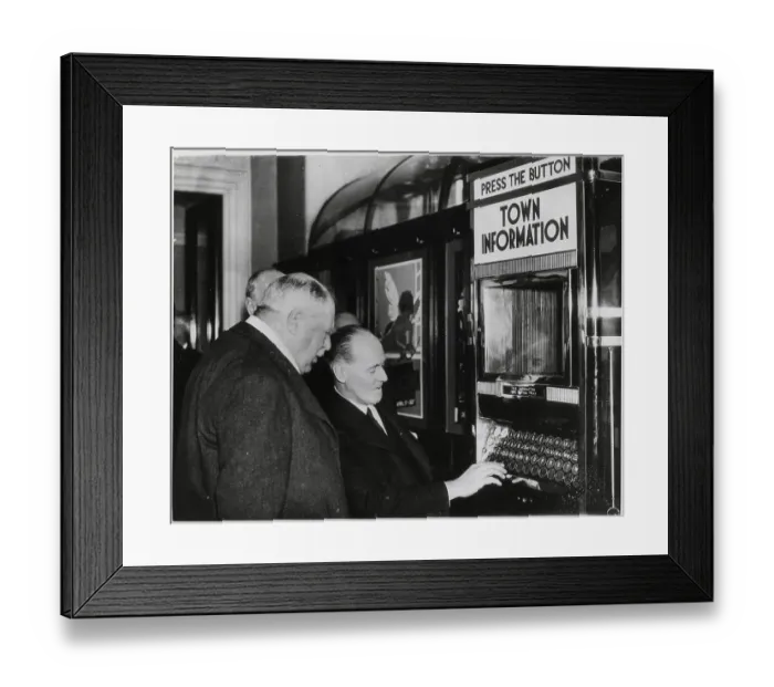 Framed Print : Men Demonstrating Automatic Info Machine Framed Print : Men Demonstrating Automatic Info Machine