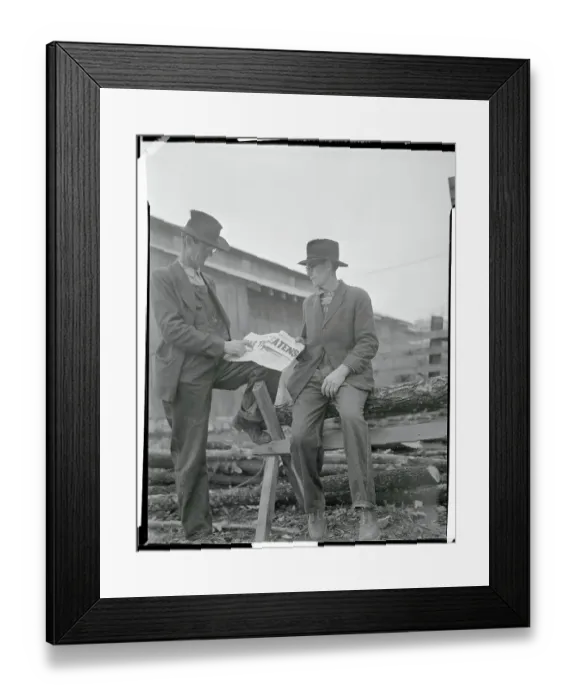 Framed Print : Two Men Reading a Newspaper Framed Print : Two Men Reading a Newspaper