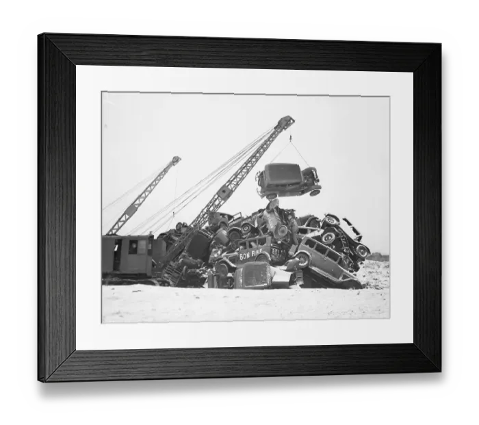 Framed Print : Crane Stacking Up Old Cars to be Burned in a Bonfire Framed Print : Crane Stacking Up Old Cars to be Burned in a Bonfire