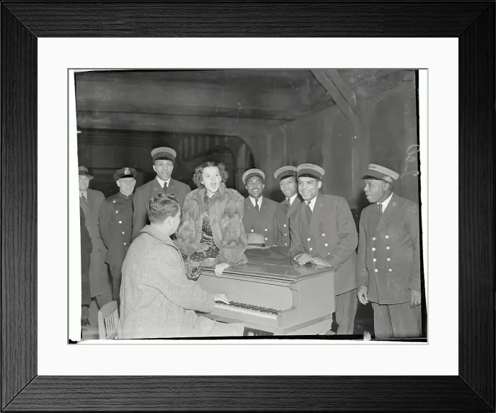 Framed Print : Judy Garland Singing with Train Station Employees at Piano Framed Print : Judy Garland Singing with Train Station Employees at Piano