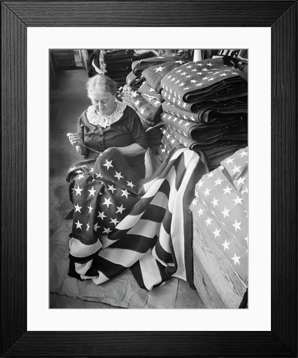Framed Print : Woman Sewing Stars on Custom Flag Framed Print : Woman Sewing Stars on Custom Flag