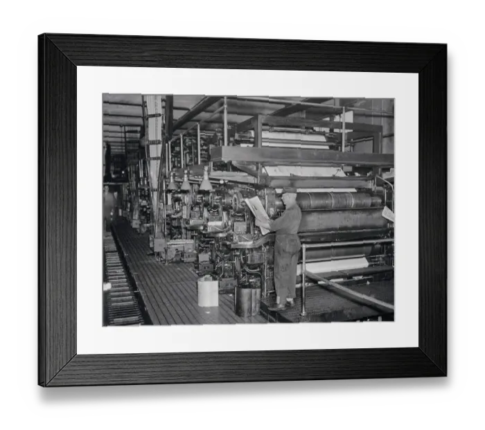 Framed Print : Employee Holding Newspaper in The Journal American Press Room