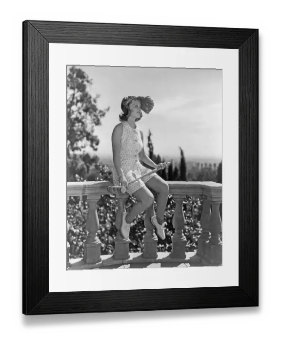 Framed Print : Bette Davis Seated / Balcony;Croquet Malle Framed Print : Bette Davis Seated / Balcony;Croquet Malle